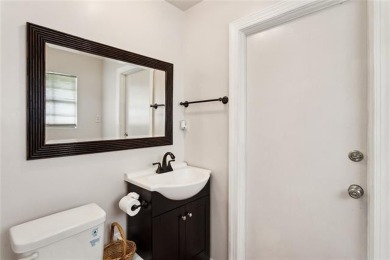 Beautifully updated home on the golf course in the gated on Beau Chene Country Club in Louisiana - for sale on GolfHomes.com, golf home, golf lot