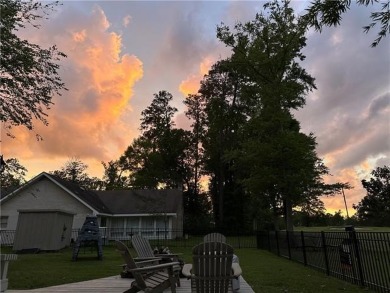 Beautifully updated home on the golf course in the gated on Beau Chene Country Club in Louisiana - for sale on GolfHomes.com, golf home, golf lot