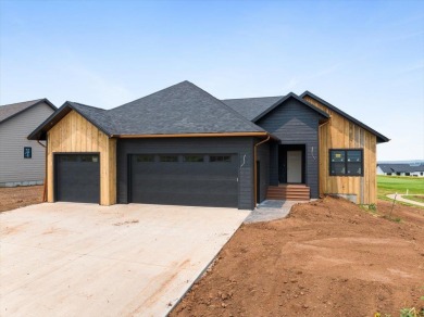 Discover the charm and elegance of this brand-new construction on Elkhorn Ridge Golf Course in South Dakota - for sale on GolfHomes.com, golf home, golf lot