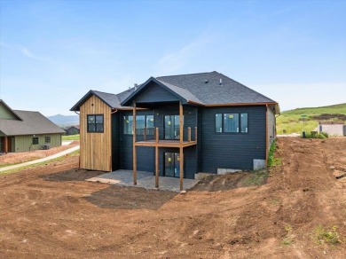 Discover the charm and elegance of this brand-new construction on Elkhorn Ridge Golf Course in South Dakota - for sale on GolfHomes.com, golf home, golf lot