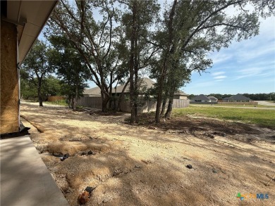 Talk about location and mature trees plus only a short golf cart on Mill Creek Golf Club in Texas - for sale on GolfHomes.com, golf home, golf lot