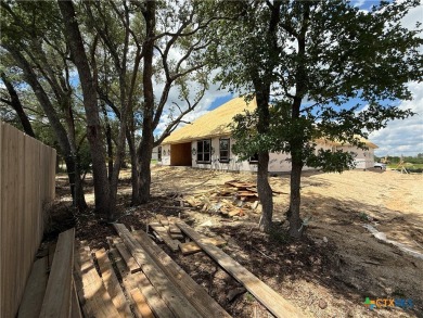 Talk about location and mature trees plus only a short golf cart on Mill Creek Golf Club in Texas - for sale on GolfHomes.com, golf home, golf lot