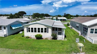 2 bed/2 bath, 1,384 sq ft of living space overlooking the Golf on Barefoot Bay Golf Course in Florida - for sale on GolfHomes.com, golf home, golf lot