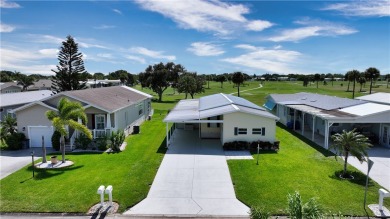 2 bed/2 bath, 1,384 sq ft of living space overlooking the Golf on Barefoot Bay Golf Course in Florida - for sale on GolfHomes.com, golf home, golf lot