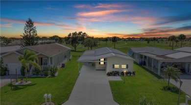 2 bed/2 bath, 1,384 sq ft of living space overlooking the Golf on Barefoot Bay Golf Course in Florida - for sale on GolfHomes.com, golf home, golf lot