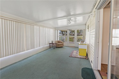 2 bed/2 bath, 1,384 sq ft of living space overlooking the Golf on Barefoot Bay Golf Course in Florida - for sale on GolfHomes.com, golf home, golf lot