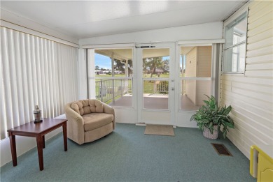 2 bed/2 bath, 1,384 sq ft of living space overlooking the Golf on Barefoot Bay Golf Course in Florida - for sale on GolfHomes.com, golf home, golf lot