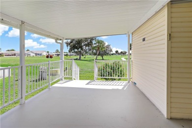 2 bed/2 bath, 1,384 sq ft of living space overlooking the Golf on Barefoot Bay Golf Course in Florida - for sale on GolfHomes.com, golf home, golf lot