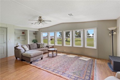 2 bed/2 bath, 1,384 sq ft of living space overlooking the Golf on Barefoot Bay Golf Course in Florida - for sale on GolfHomes.com, golf home, golf lot