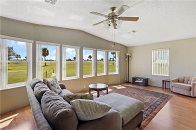 2 bed/2 bath, 1,384 sq ft of living space overlooking the Golf on Barefoot Bay Golf Course in Florida - for sale on GolfHomes.com, golf home, golf lot