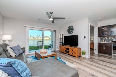 One of the BEST condo remodels in Isla Del Sol!  Photos do not on Isla Del Sol Yacht and Country Club in Florida - for sale on GolfHomes.com, golf home, golf lot