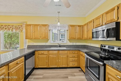 Set on a prime corner lot in the heart of Tellico Village, this on Toqua Golf Course - Loudon County in Tennessee - for sale on GolfHomes.com, golf home, golf lot
