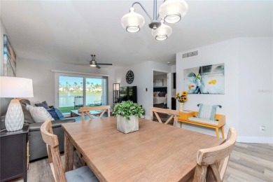 One of the BEST condo remodels in Isla Del Sol!  Photos do not on Isla Del Sol Yacht and Country Club in Florida - for sale on GolfHomes.com, golf home, golf lot