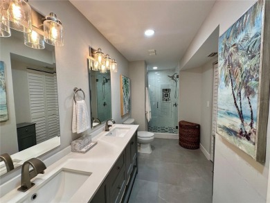 One of the BEST condo remodels in Isla Del Sol!  Photos do not on Isla Del Sol Yacht and Country Club in Florida - for sale on GolfHomes.com, golf home, golf lot
