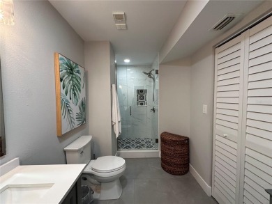 One of the BEST condo remodels in Isla Del Sol!  Photos do not on Isla Del Sol Yacht and Country Club in Florida - for sale on GolfHomes.com, golf home, golf lot