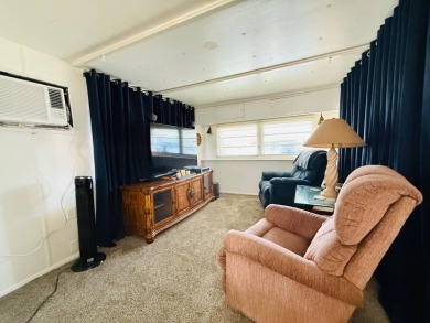Charming 2BR/1BA home in Citrus Grove 55+ Resident-Owned on Heather Hills Golf Course in Florida - for sale on GolfHomes.com, golf home, golf lot