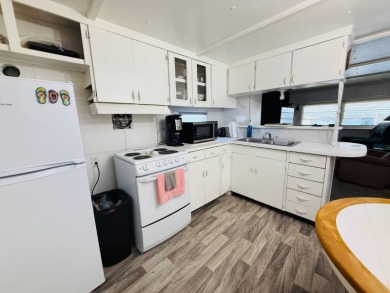 Charming 2BR/1BA home in Citrus Grove 55+ Resident-Owned on Heather Hills Golf Course in Florida - for sale on GolfHomes.com, golf home, golf lot