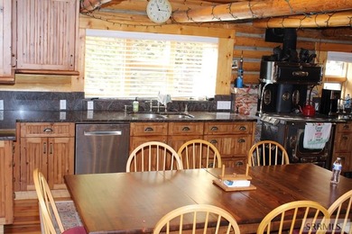 Gorgeous 4 bedroom home on a .99 lot adjacent to golf course on  in  - for sale on GolfHomes.com, golf home, golf lot