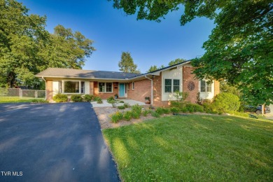 Welcome home to this one level brick beauty with a basement! on Johnson City Country Club in Tennessee - for sale on GolfHomes.com, golf home, golf lot