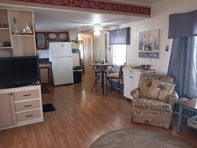 Charming 2 bedroom/2 bath split floor plan with furnished on Sara Bay Country Club in Florida - for sale on GolfHomes.com, golf home, golf lot