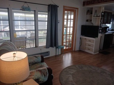 Charming 2 bedroom/2 bath split floor plan with furnished on Sara Bay Country Club in Florida - for sale on GolfHomes.com, golf home, golf lot