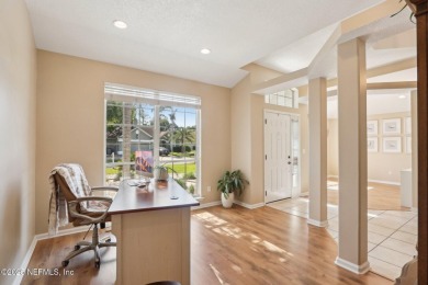 Stunning home with pond view in the sought-after Eagle Harbor on Eagle Harbor Golf Club in Florida - for sale on GolfHomes.com, golf home, golf lot