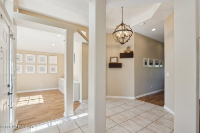 Stunning home with pond view in the sought-after Eagle Harbor on Eagle Harbor Golf Club in Florida - for sale on GolfHomes.com, golf home, golf lot