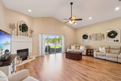 Stunning home with pond view in the sought-after Eagle Harbor on Eagle Harbor Golf Club in Florida - for sale on GolfHomes.com, golf home, golf lot
