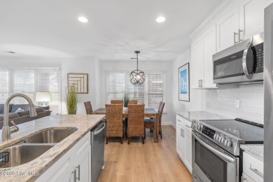 Welcome to your coastal haven--a completely upgraded first-floor on Sea Trail Golf Resort in North Carolina - for sale on GolfHomes.com, golf home, golf lot