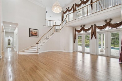 Welcome to this an exquisite one of a kind custom-built brick on Wentworth Golf Club in Florida - for sale on GolfHomes.com, golf home, golf lot