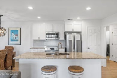 Welcome to your coastal haven--a completely upgraded first-floor on Sea Trail Golf Resort in North Carolina - for sale on GolfHomes.com, golf home, golf lot