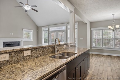 Welcome to this stunning two-story home located in the gated on Carolina Lakes Country Club in North Carolina - for sale on GolfHomes.com, golf home, golf lot