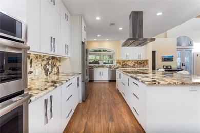 PARADISE FOUND! Rare opportunity for snowbird, investor or on BallenIsles Golf and Country Club in Florida - for sale on GolfHomes.com, golf home, golf lot