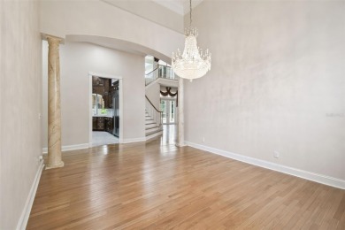 Welcome to this an exquisite one of a kind custom-built brick on Wentworth Golf Club in Florida - for sale on GolfHomes.com, golf home, golf lot