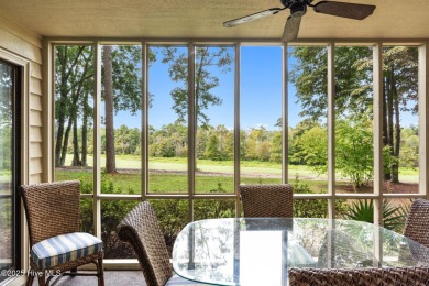 Welcome to your coastal haven--a completely upgraded first-floor on Sea Trail Golf Resort in North Carolina - for sale on GolfHomes.com, golf home, golf lot