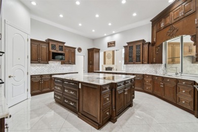 Welcome to this an exquisite one of a kind custom-built brick on Wentworth Golf Club in Florida - for sale on GolfHomes.com, golf home, golf lot