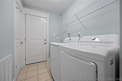 Welcome to this stunning two-story home located in the gated on Carolina Lakes Country Club in North Carolina - for sale on GolfHomes.com, golf home, golf lot