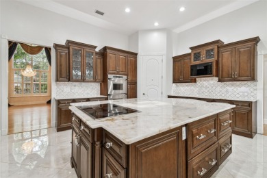 Welcome to this an exquisite one of a kind custom-built brick on Wentworth Golf Club in Florida - for sale on GolfHomes.com, golf home, golf lot