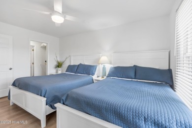Welcome to your coastal haven--a completely upgraded first-floor on Sea Trail Golf Resort in North Carolina - for sale on GolfHomes.com, golf home, golf lot