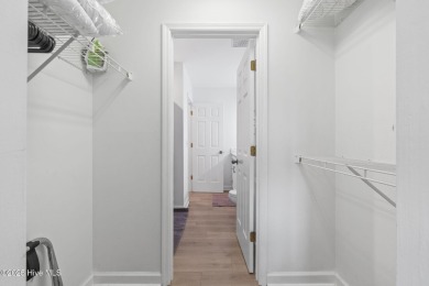 Welcome to your coastal haven--a completely upgraded first-floor on Sea Trail Golf Resort in North Carolina - for sale on GolfHomes.com, golf home, golf lot