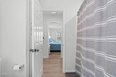 Welcome to your coastal haven--a completely upgraded first-floor on Sea Trail Golf Resort in North Carolina - for sale on GolfHomes.com, golf home, golf lot