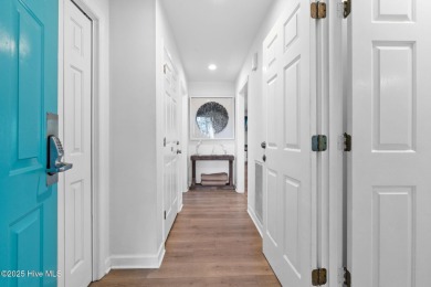 Welcome to your coastal haven--a completely upgraded first-floor on Sea Trail Golf Resort in North Carolina - for sale on GolfHomes.com, golf home, golf lot