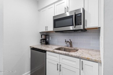 Welcome to your coastal haven--a completely upgraded first-floor on Sea Trail Golf Resort in North Carolina - for sale on GolfHomes.com, golf home, golf lot