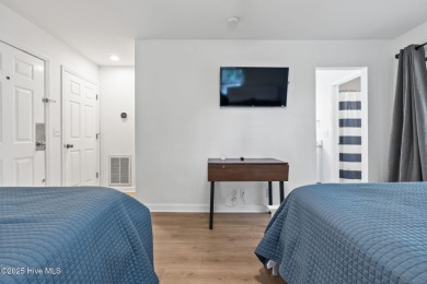 Welcome to your coastal haven--a completely upgraded first-floor on Sea Trail Golf Resort in North Carolina - for sale on GolfHomes.com, golf home, golf lot