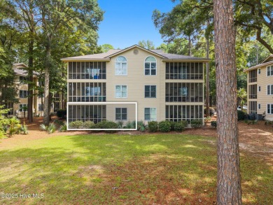 Welcome to your coastal haven--a completely upgraded first-floor on Sea Trail Golf Resort in North Carolina - for sale on GolfHomes.com, golf home, golf lot