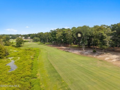 Welcome to your coastal haven--a completely upgraded first-floor on Sea Trail Golf Resort in North Carolina - for sale on GolfHomes.com, golf home, golf lot