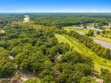 Welcome to your coastal haven--a completely upgraded first-floor on Sea Trail Golf Resort in North Carolina - for sale on GolfHomes.com, golf home, golf lot