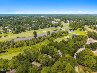 Welcome to your coastal haven--a completely upgraded first-floor on Sea Trail Golf Resort in North Carolina - for sale on GolfHomes.com, golf home, golf lot
