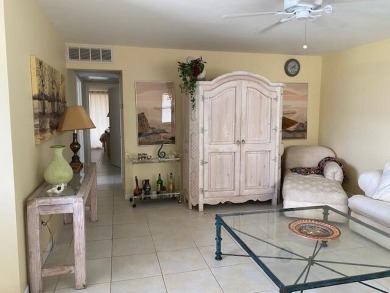 Welcome home to this move in ready 2nd floor corner in the on Kings Point Golf - Executive in Florida - for sale on GolfHomes.com, golf home, golf lot