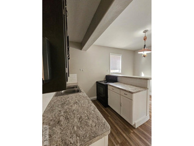 Charming and affordable 3-bedroom, 1-bath home tucked just off on  in  - for sale on GolfHomes.com, golf home, golf lot